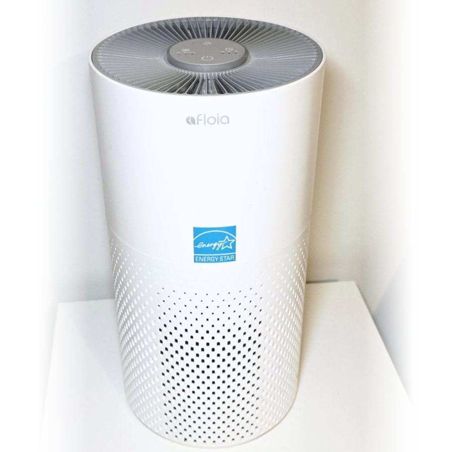 My white Afloia air purifier on a small white table