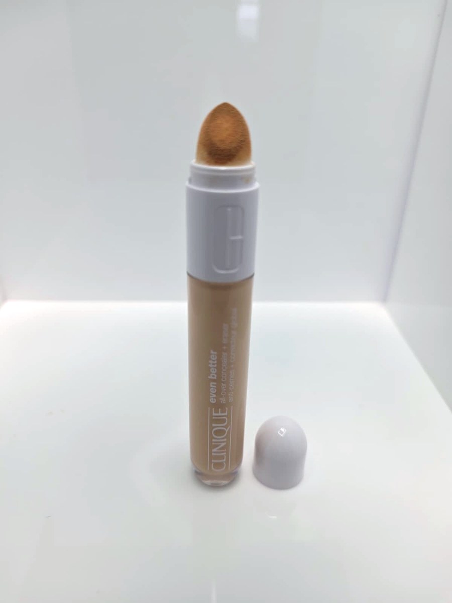 The Clinique Even Better concealer with the cap off, showing the sponge tip