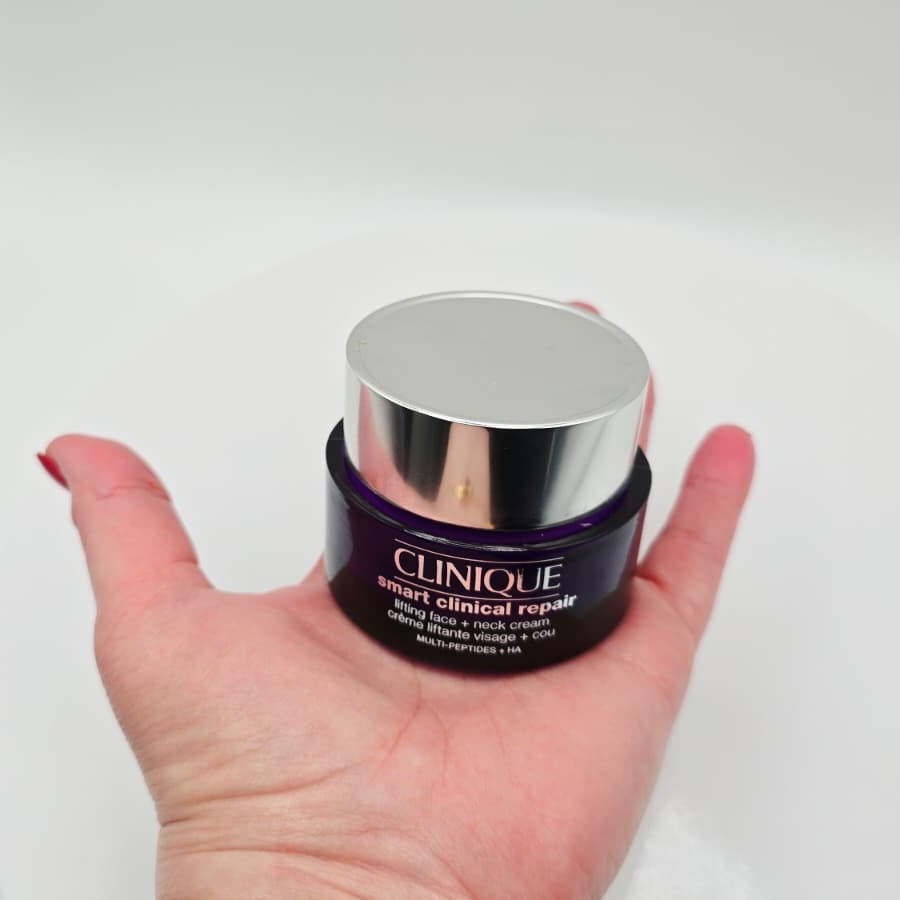 My Clinique Smart Clinical Repair Lifting Face + Neck Cream in the palm of my hand