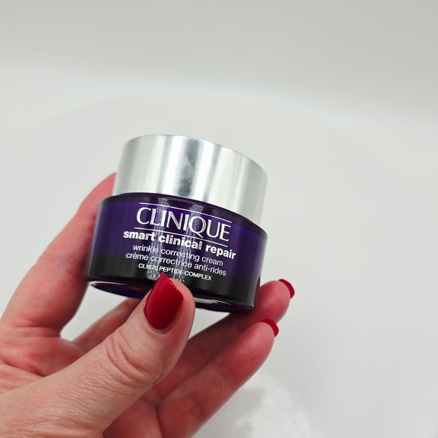 My Clinique Smart Clinical Repair Wrinkle Correcting Cream in my hand