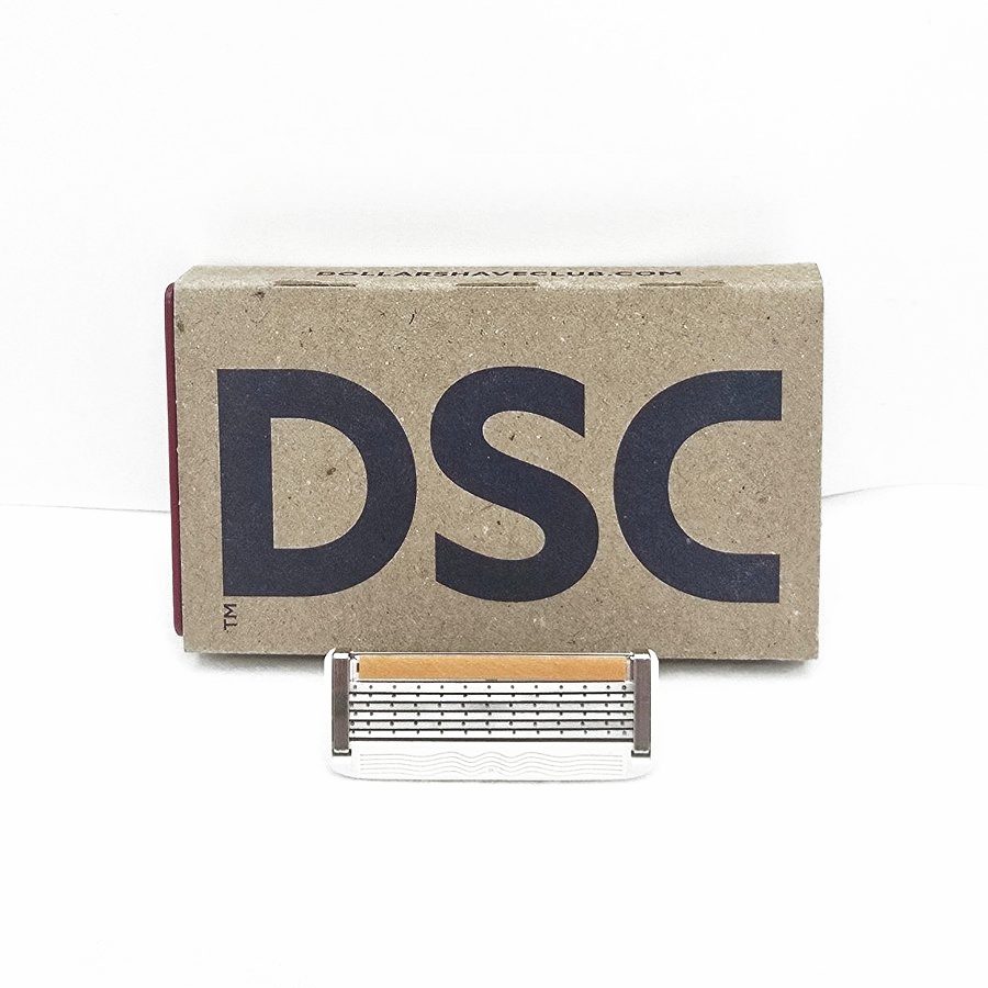 My Dollar Shave Club 6 blade cartridge in front of its box