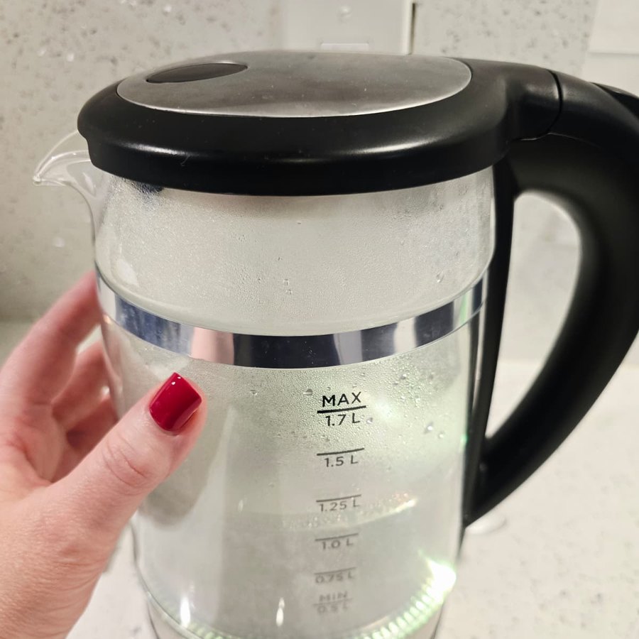 Close-up of the Hamilton Beach kettle's liter markings, from 0.5 to 1.7 L