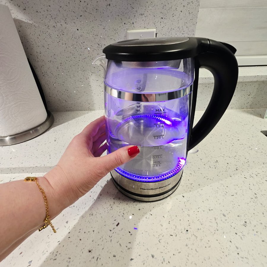 My Hamilton Beach kettle glowing purple on my kitchen counter