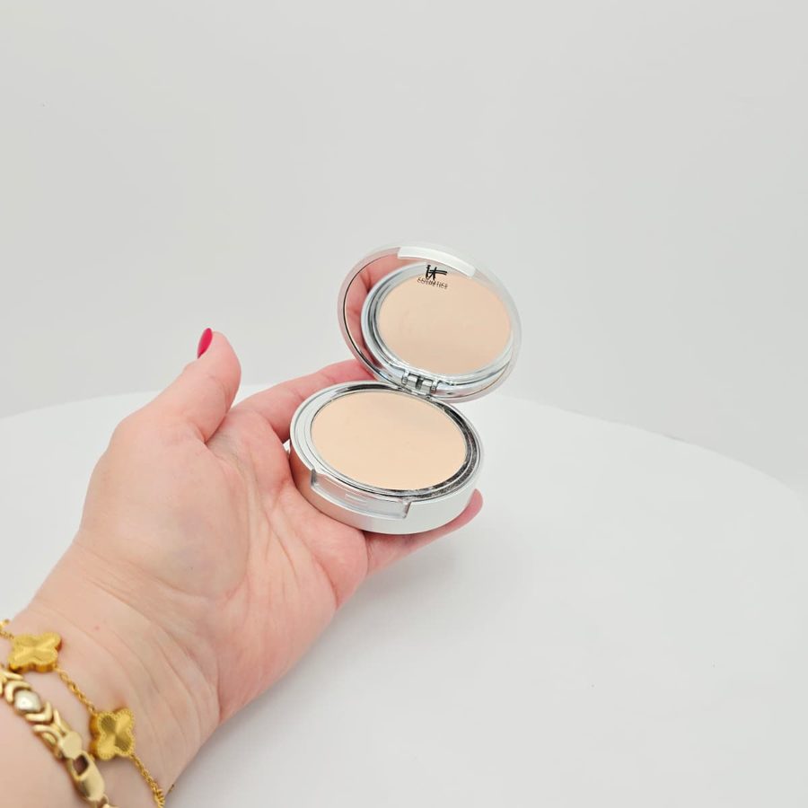 My IT Cosmetics CC+ powder open in my hand, shade Fair (W)