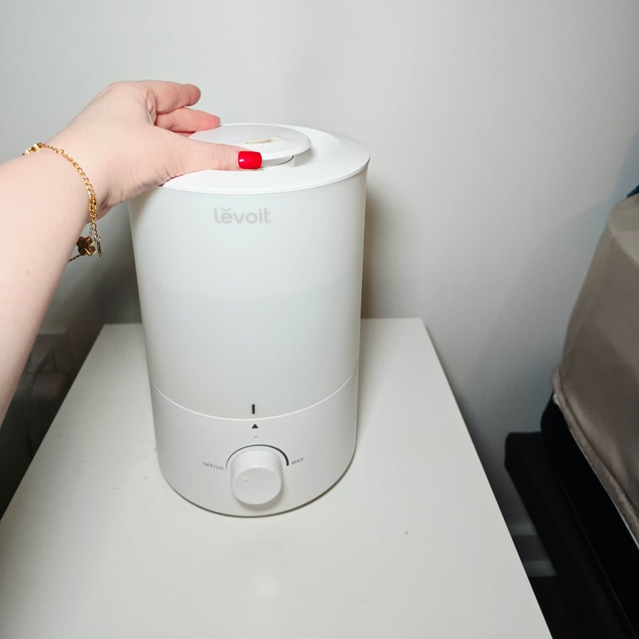 My hand on the turning nozzle of my Levoit humidifier