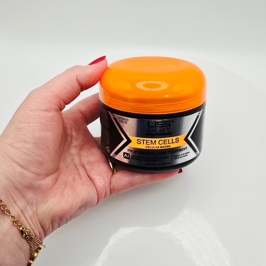 My jar of Liss Expert Stem Cells hair treatment in my hand, with the orange lid on