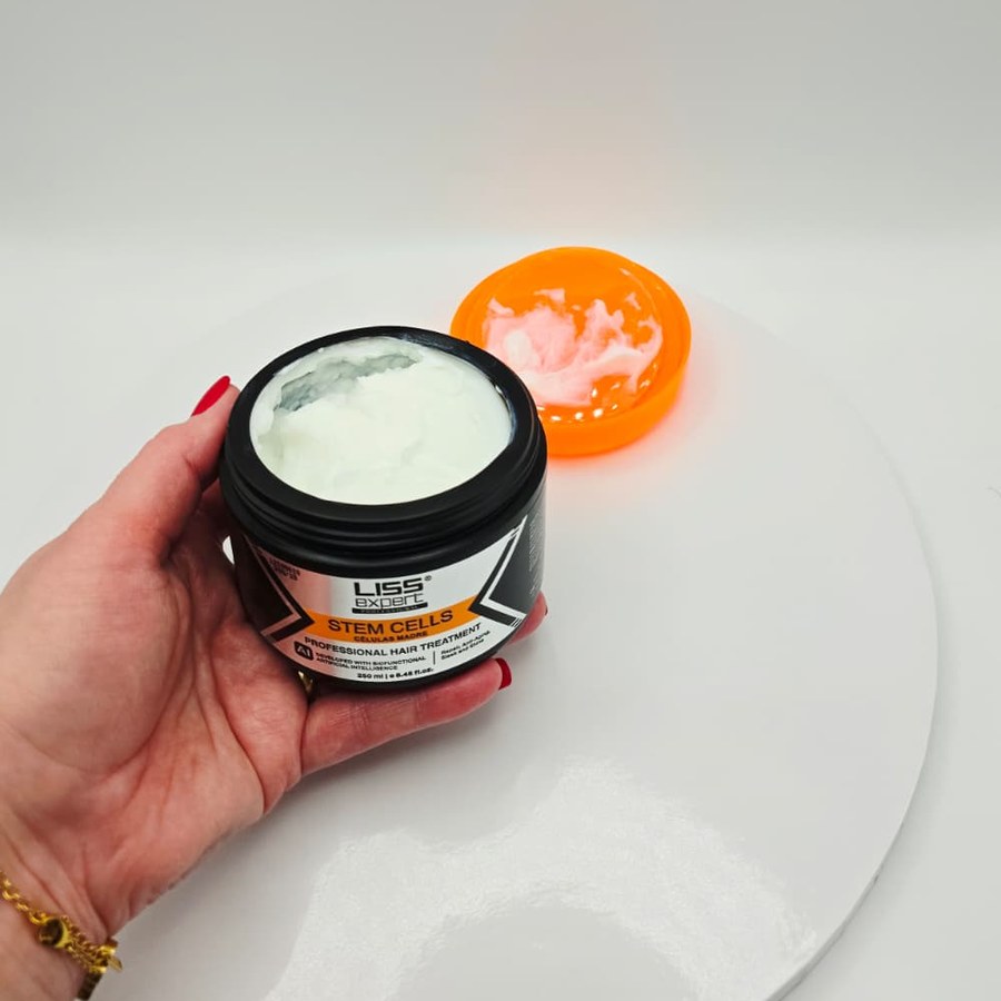 My open jar of Liss Expert Stem Cells showing the white cream inside, with the orange lid beside it