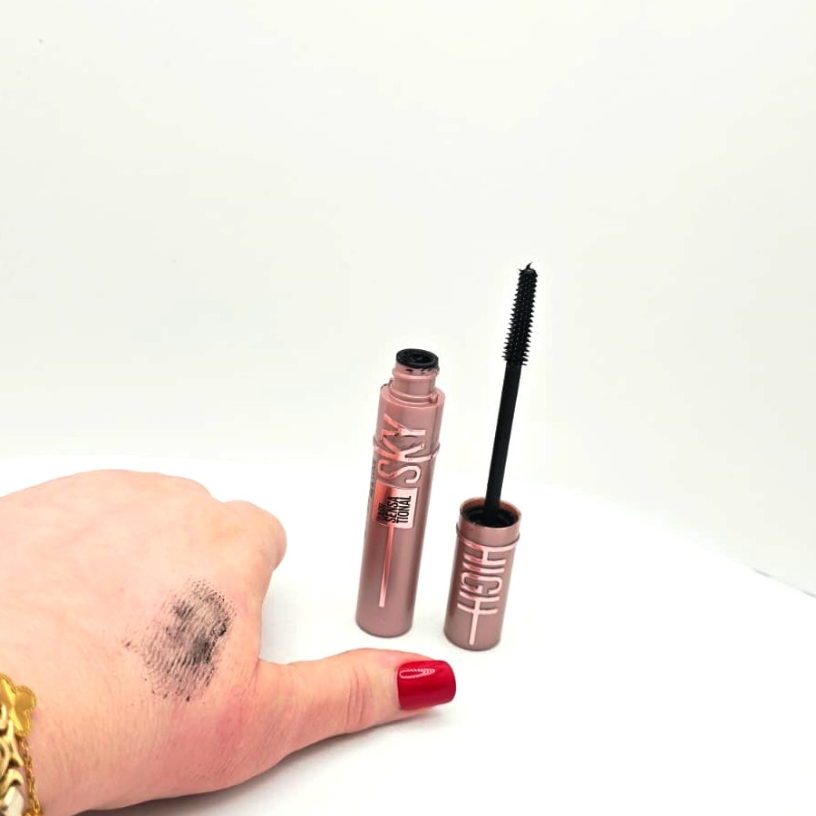 A swatch of Blackest Black on the back of my hand, next to the open mascara