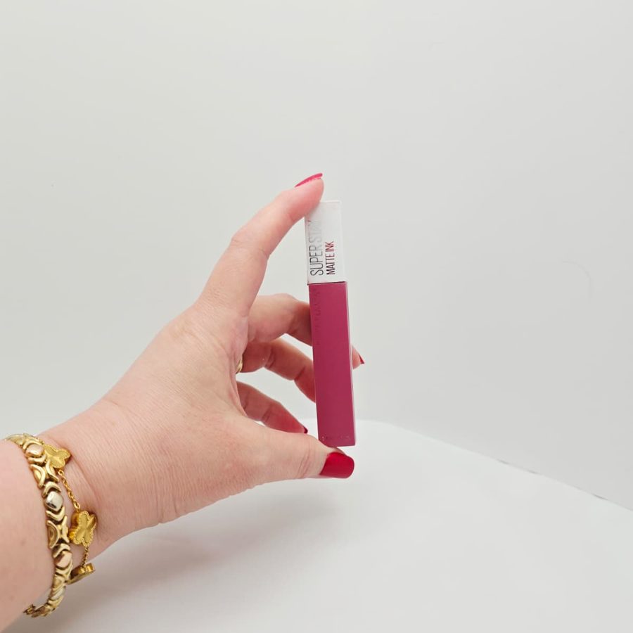 My hand holding my Maybelline Super Stay Matte Ink in Lover 15