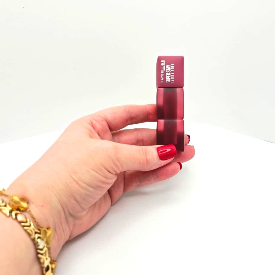 My Maybelline Super Stay Teddy Tint resting in my hand