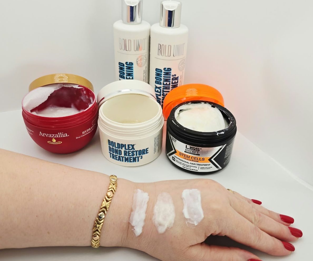 My three hair treatments, open on my counter, with swatches on my hand, left to right: Arvazallia Argan Oil Mask, Boldplex Bond Restore Treatment 3, Liss Expert Stem Cells