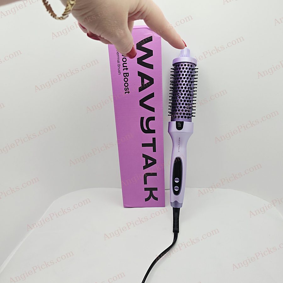 My finger touching the tip of the Wavytalk Blowout Boost