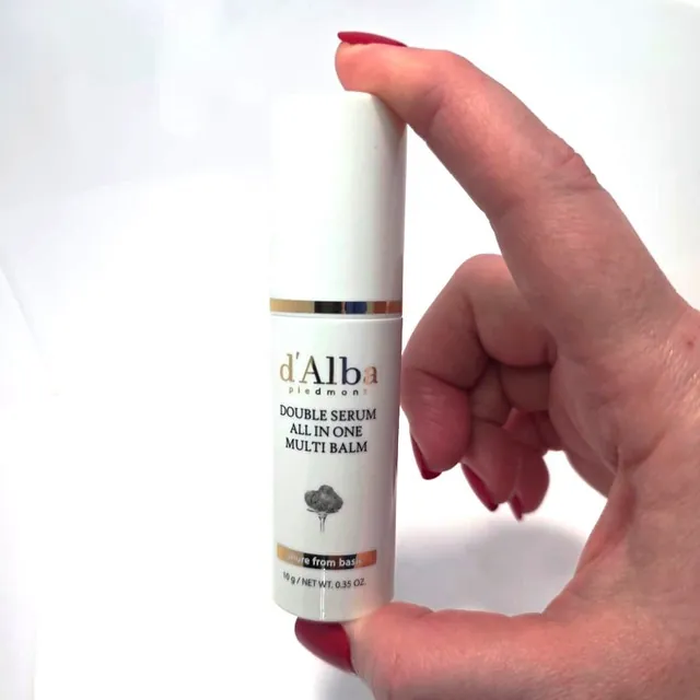 d'Alba Double Serum All in One Multi Balm in Angie's hand